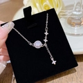 Collana Saturno in acciaio al titanio argento con zirconi scintillanti e stelle a croce - Stile Stella Guardiana Saturno (X384) / Argento