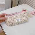 Detail of floral cotton pouch showing pink zipper closure and striped inner lining - Pink Floral