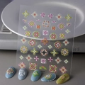 Self-adhesive 5D embossed nail stickers featuring colorful floral and geometric designs - FEB-646