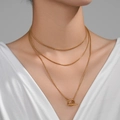 Three-layer gold snake chain necklace for women featuring a stylish metal toggle clasp - 1.2m Gold Minimalist OT Clasp Long Chain
