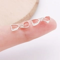 Polished silver pendant pinch bails for DIY jewelry making shown on fingertips - Bright Silver