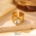 Gold plated wide band ring with a large faceted gemstone and 12.9mm center setting - Adjustable Open / Gold Hammered Wavy Texture with Round Clear Stone (JOM25006)
