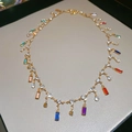 Golden alloy necklace featuring colorful rhinestones on a beige leather display - 16# Diamond-encrusted Glass Tassel Colorful Necklace