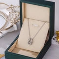 Silver deer antler pendant necklace with dancing stone diamond in green jewelry box - Silver