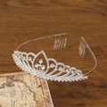 Elegant silver crown tiara with heart pattern rhinestones and integrated hair combs - Style J