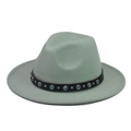 Close-up of mint green wool fedora hat with black band and turquoise metal accents - Taro