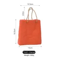 Modern orange red ceramic paper bag vase with brown rope handles for minimalist home decor - Orange Red