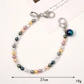 Colorful candy-colored beaded strap with heart clasps and iridescent charm, 27cm. - Artificial Pearl Hand Strap (K3707)