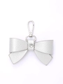 Silver leather bow keychain with crystal detail and metallic ring for handbags - Silver