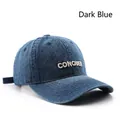 Dark blue denim baseball cap featuring white 3D embroidery of CONQUER in retro style - Dark Blue