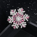 Broche flocon de neige rotative avec base argentée et pierres roses de forme rectangulaire - Rose