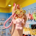 Portachiavi elefante rosa in resina con corona e cinturino in pelle intrecciata - Set di Corda in Pelle / Rosa