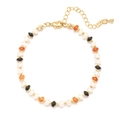 Bohemian natural stone beaded bracelet with gold accents and adjustable lobster clasp closure - White Orange Black