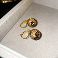 Macro detail of 18k gold plated sphere earrings with sparkling white and amber rhinestones - Gold Brown Black Pave Ball Style (27#)