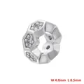 Macro detail of silver hexagonal spacer bead with dimensions 8.5mm by 4.0mm - Style D: Hexagonal Geometry (VZ431B1) / 4*8.5mm / White Gold