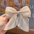 Sparkly champagne bow hair clip in lightweight glossy fabric for elegant styling - Mermaid Shimmer Beige