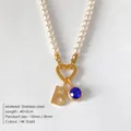 Elegante parelketting met 14K gouden initiaal B en blauwe edelsteen hanger sieraden - Letter B / Goud