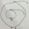 Parure de bijoux argentée avec pendentifs cœur et lettre L incluant collier et bracelet - Lettre L Style (8964) / Argent