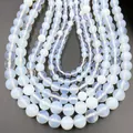 U-shaped rows of translucent white synthetic moonstone beads on a black background - Opal / 4mm (approximately 90 Beads) 38cm Long