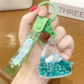Cute polar bear liquid quicksand keychain with green ship pendant and PVC wristlet strap - Quicksand Sailboat - Green
