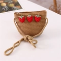 Detail of straw woven crossbody bag for girls with red strawberry patches and zip closure - Three Strawberries Style / Khaki