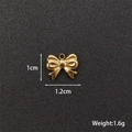 Polished gold bow pendant charm for DIY jewelry with 1.2cm width dimensions and weight - Bow