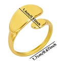 Detailed view of curved gold ring with size measurements 1.4cm and 1.7cm - Gold