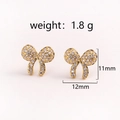 Pink bow earrings with zircon stones and golden finish, measuring 11mm by 12mm - Style 1 Gold