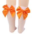 Close-up of white mesh kids socks featuring a large vibrant orange silk bow detail - One Size (Parent-Child) / White Fishnet / Orange Bow
