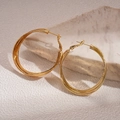 Detailed close-up of 18k gold plated multi-layer geometric hoop earrings on stone base - 18K Real Gold Plated Style / Gold