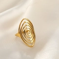 Detailed view of a gold spiral vortex ring on a luxury white silk fabric background - Round Hollow Line / Gold