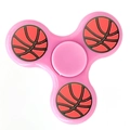 Pink three-arm fidget spinner featuring orange and black basketball pattern weights - Classic Pink Basketball Pattern