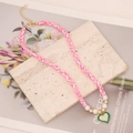 Bohemian colorful clay bead necklace with green enamel heart pendant and pearls - Spotted Pink