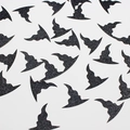 Sparkling black glitter witch hat confetti for Halloween party decor on white background - Black Glitter Magic Hat