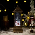 Vintage bronze Christmas lantern with snowman family, warm light, and glitter snow effect - Snowman Family