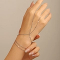 Minimalist silver multi-layer hand chain bracelet with sequins on female model - 19 White Ks243