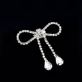 Small sparkling silver bow brooch with white rhinestones and clear teardrop crystals - Small Size - Water Drop Pendant