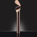 Angled makeup brush with brown handle and foundation on bristles, professional beauty tool - Contour Brush