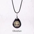 Waterdrop obsidian pendant necklace featuring golden tree of life with black braided cord - Tree of Life Obsidian Pendant