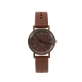 Detailed macro view of minimalist brown quartz watch dial with white numeric markers - Brown