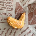 Realistic fried chicken nugget hair clip with a golden crispy finish on oil paper - Roasted Chicken Wing