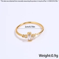 Slim gold stainless steel ring featuring a rectangular crystal and accent stones - Rectangular Main Stone / Gold