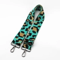 Detail of adjustable green leopard print bag strap with durable grey lobster clasps - Sky Blue With Gunmetal Buckle