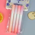 Pack of four dual-tip gradient highlighters in soft orange and purple tones - Bagged Peach Cream (4 Pcs)