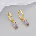 Detail of 925 stamp on gold hoop earring featuring a rectangular purple zircon stone - Copper / Yellow Gold with Purple Zircon