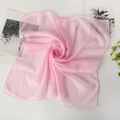 Pink 100% silk square chiffon scarf shown with floral props and rolled edges - Light Pink