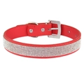 Sparkling red pet collar with rows of rhinestones and a silver metal buckle on white background - Red