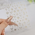Close-up of golden star and moon nail art stickers C7304 with delicate hollow design - C7304 / Champagne Gold