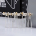 Detailed view of handmade silver metal hair comb with white crystal stones and wire wrap - Rutilated Quartz + 20-Tooth Silver Comb