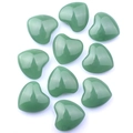 Set of ten heart-shaped green quartz stones with a smooth polished finish and natural shine - Melted Green Jade